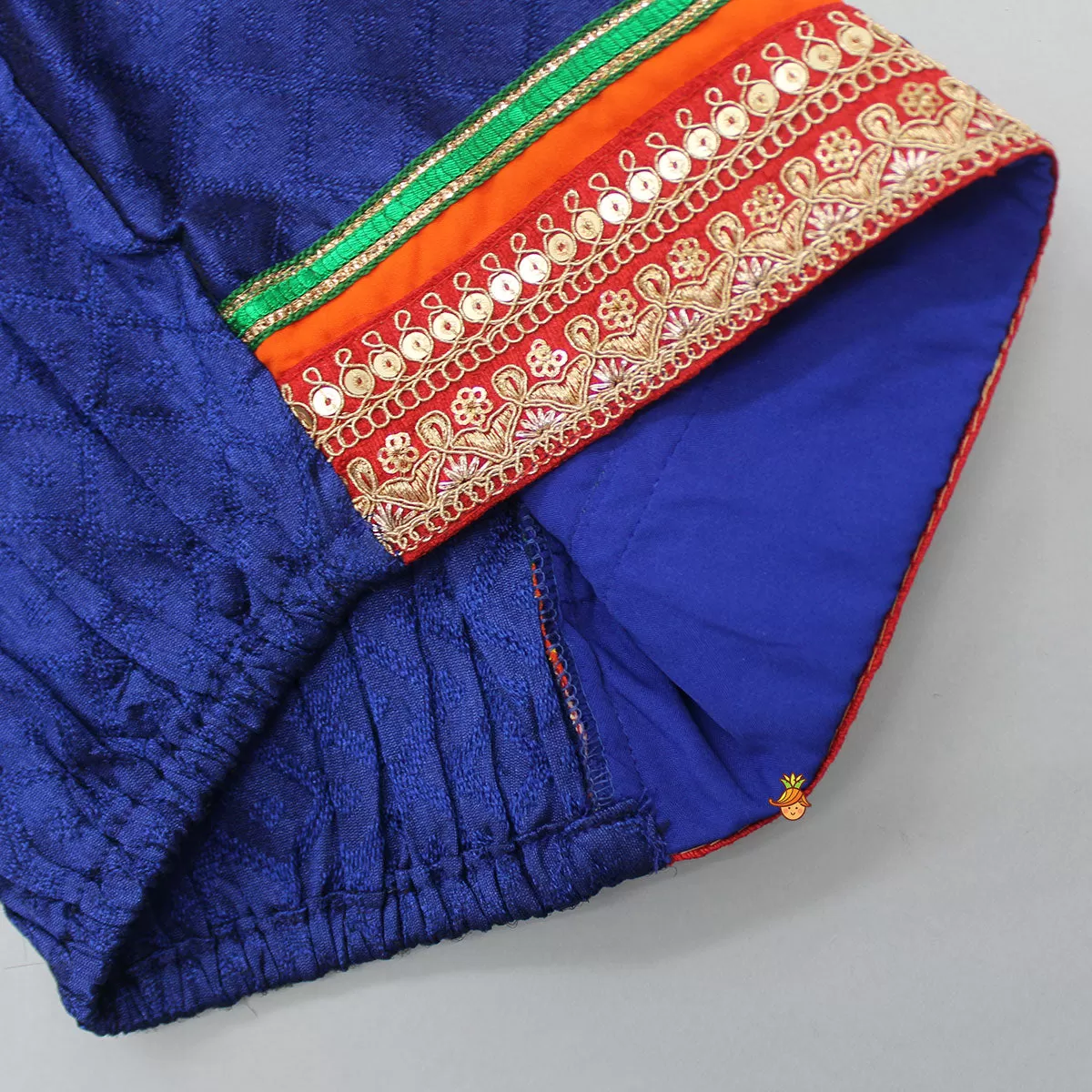 Dark Blue Top And Orange Dhoti