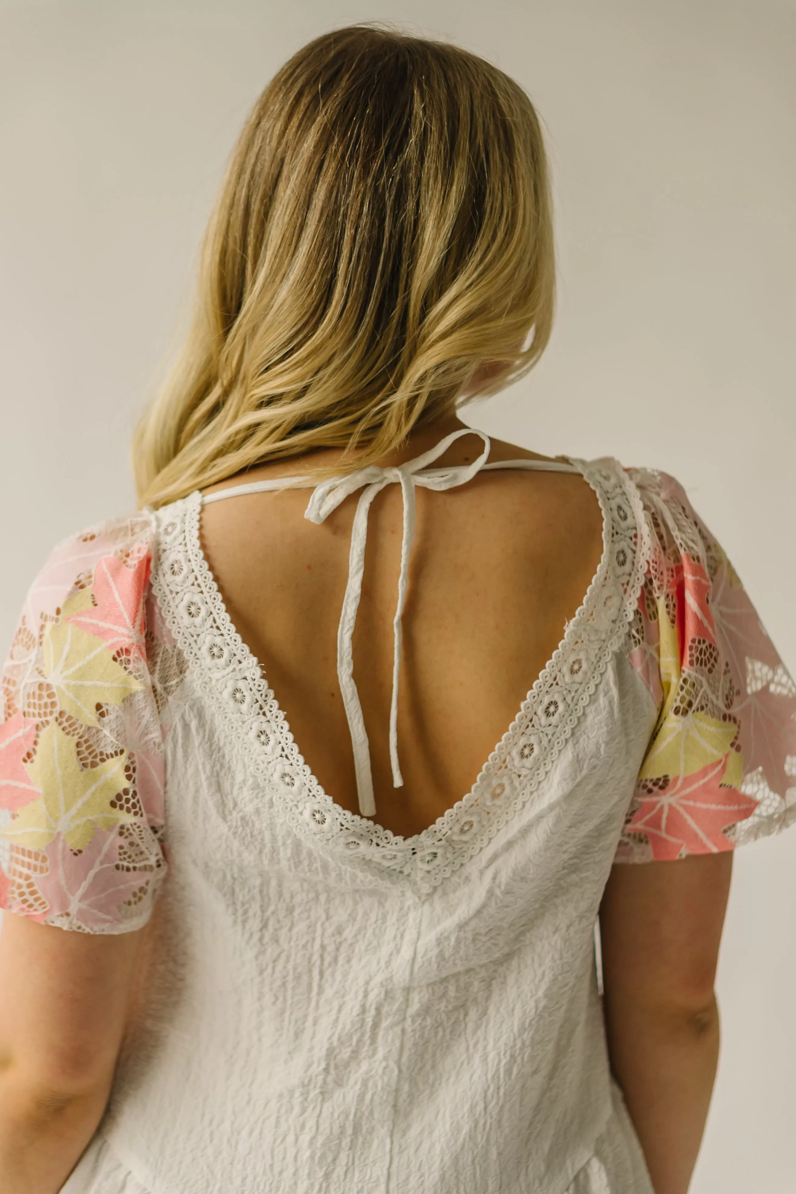 The Merrium Lace Detail Dress in White   Pink Multi